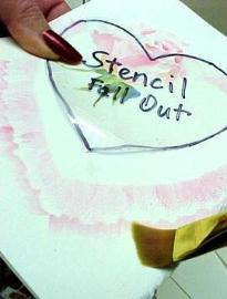 Painting a watercolor ruffle around the valentine